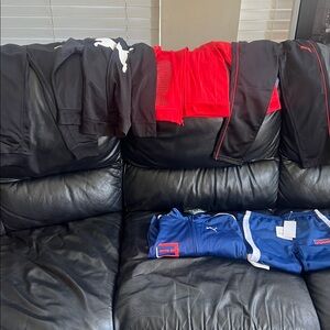 3 PUMA Track Suits size 5. All INCLUDED.